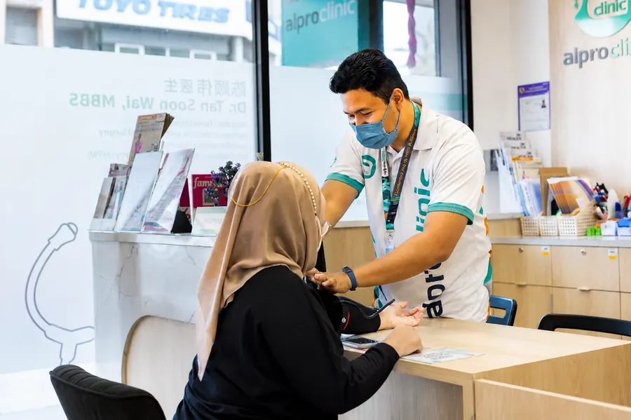 Alpro Pharmacy storefront and healthcare professional